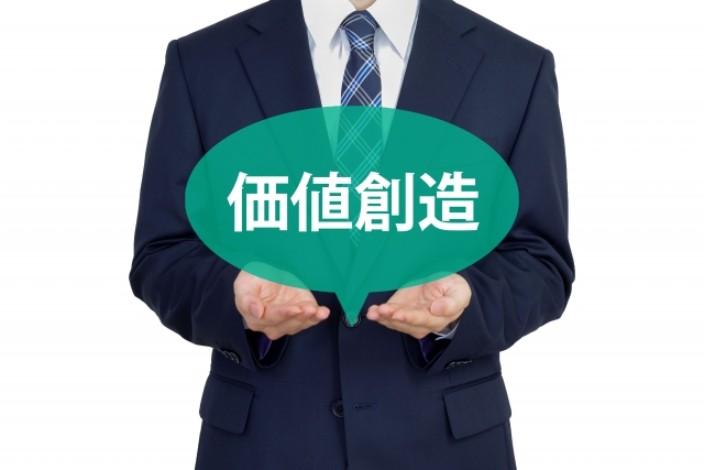 価値創造の吹き出しとビジネスマン